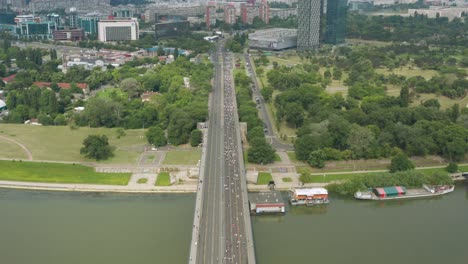 Many-participants-crossing-a-big-bridge-during-a-Marathon