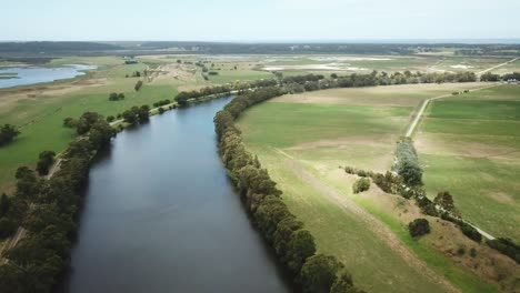 Drone-footage-along-the-Snowy-River-and-adjacent-wetlands-near-Marlo,-in-Gippsland,-Victoria,-Australia,-December-2020