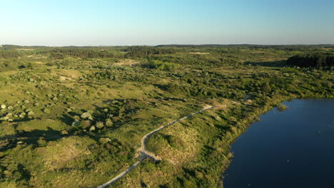 Beautiful-Aerial-footage-of-National-Park-Kennemerland-with-sunset-in-The-Netherlands