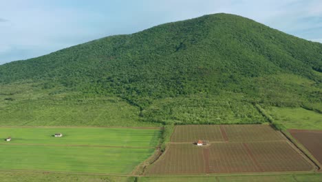 Aerial:-remote-farmland-crops-growing-in-European-highland-countryside