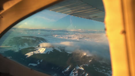 Flying-in-a-Small-Airplane-Above-Snow-Capped-Peaks-of-Rocky-Mountain-Near-Aspen-Colorado-USA,-Scenic-Maroon-Bells-Flight,-Plane-Passenger-POV