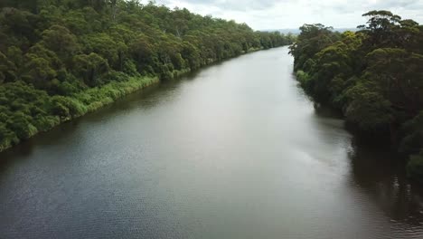 Drone-footage-over-the-Snowy-River-between-Marlo-and-Orbost,-in-Gippsland,-Victoria,-Australia,-December-2020