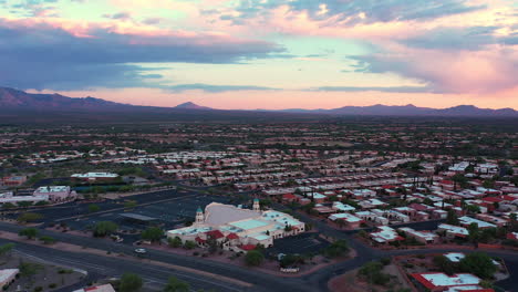 Aerial-View-Of-Green-Valley,-Arizona-With-Santa-Rita-Mountains-In-Background---drone-shot