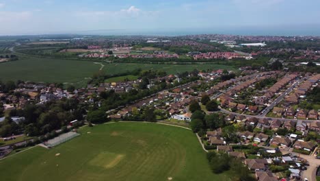4K-high-altitude-video-of-Herne-in-Kent-with-playing-fields