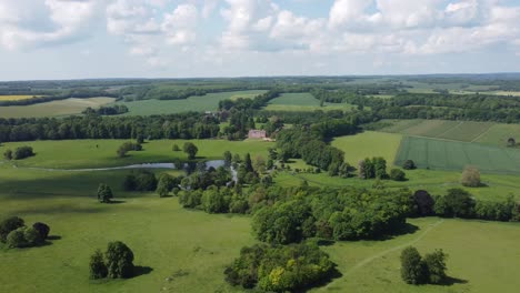4K-drone-video-moving-away-from-a-country-house-in-Kent,-UK