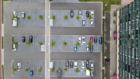 Aerial-top-view-of-parking-lot-in-a-clean-city-center