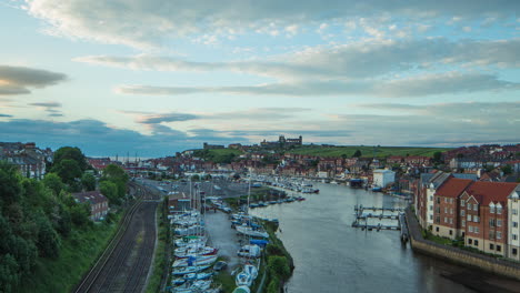 Whitby-Harbour-Day-to-Dusk-to-Night-Timelapse,-Summer-evening,-tourists