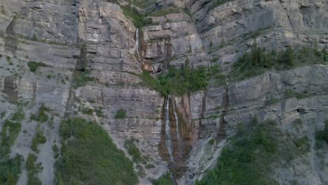 Aerial:-Bridal-Veil-Falls-cascading-down-Provo-Canyon-in-Utah,-United-States