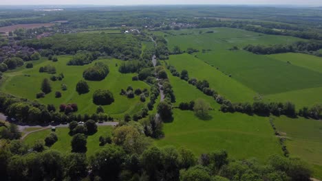 4K-drone-video-of-a-road-running-away-from-the-village-of-Herne-near-Herne-Bay