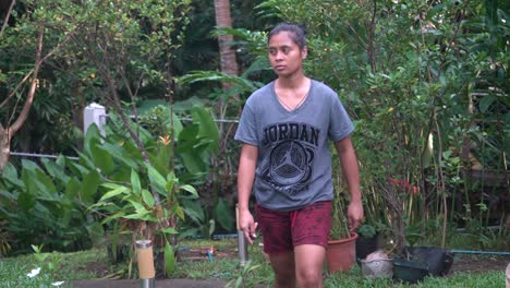 Portrait-Of-A-Young-Woman-At-The-Orphanage-Home-In-The-Philippines-Walking-Towards-The-Camera