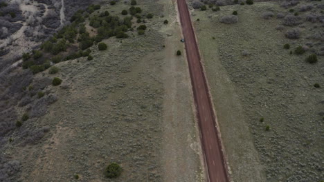Dirt-Road-in-Beautiful-Mountain-Landscape-in-Utah,-USA---Aerial