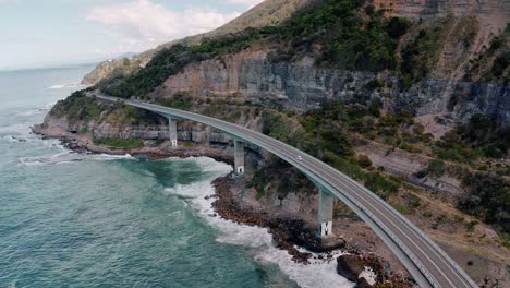 Bird's-Eye-View-Of-Seacliff-Bridge-Beside-The-Rocky-Cliff-At-New-South-Wales,-Australia