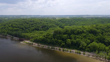 Aerial-Establishing-Shot-of-Julien-Dubuque-Monument-Perched-Along-the-Mississippi-River-in-Summer