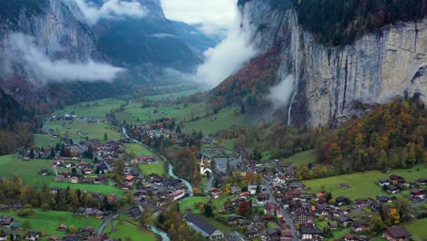 Aerial-footage-of-lauterbrunnen-village-located-in-the-Swiss-mountains