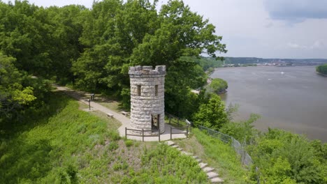 Aerial-Orbiting-Shot-of-Julien-Dubuque-Monument-in-Dubuque,-Iowa-Along-the-Mississippi-River