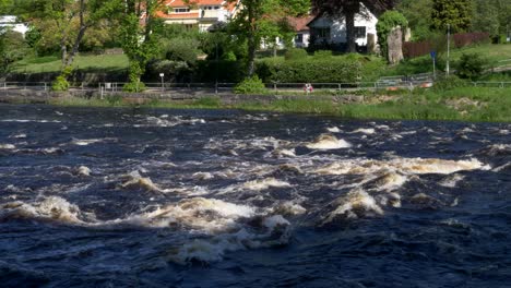 Water-Flowing-Over-Rapids-At-The-River-Atran-In-Falkenberg,-Famous-for-Fishing-In-Sweden