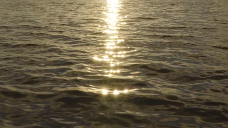 ocean-water-waves-with-reflected-sunbursts-landscape