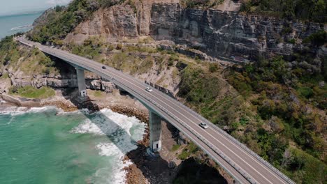 Vehicles-Travelling-At-Sea-Cliff-Bridge-In-Summer-At-NSW,-Australia
