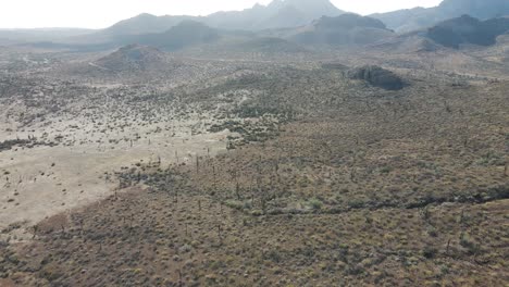 Aerial-shot-of-Mexican-desert,-barren-dry-mountainous-wilderness
