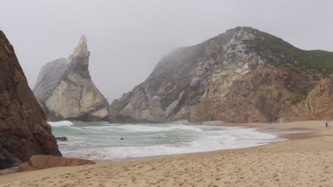 Foggy,-Stormy-Day-at-Praia-da-Ursa-by-the-Atlantic-Coast,-Portugal
