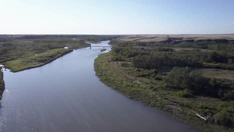 Retreating-aerial-of-Bow-River-bridge-on-Siksika-Nation-in-Alberta