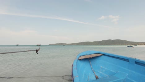 View-over-blue-fishing-boats-reveals-Saracen-Bay-heavenly-Beach-Utopia