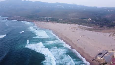 An-Orbiting-Shot-of-Guincho-Beach,-Portugal
