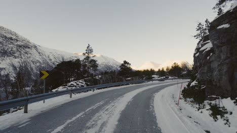Beautiful-View-Of-The-Snowy-Mountains-In-A-Leisurely-Drive-In-Eresfjord-Norway---medium-shot