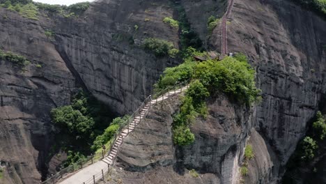 Hiking-steps-over-mountain-rocky-ridge,-Bajiaozhai-shan-mountain,-China,-aerial