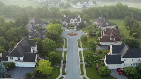 Aerial-dolly-shot-of-mansions-in-upscale-residential-home-development