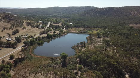 Aerial-shot-of-a-large-lake-at-the-historic-gold-mining-town-of-El-Dorado,-in-Victoria-Australia