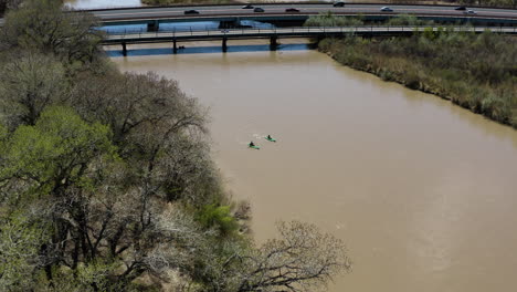 Two-People-Kayaking-on-River-in-Albuquerque,-New-Mexico---Aerial