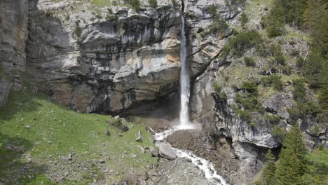 Rotation-aerial-around-fantastic-waterfall-hidden-in-the-Swiss-Alps