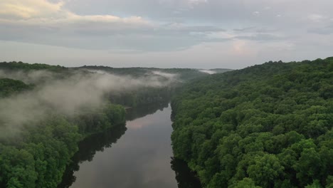 Forest-river-and-rising-mist-in-early-summer-morning,-aerial-drone-view