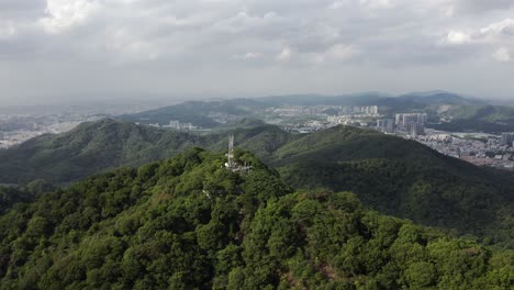 Aerial:-Baiyun-Mountain-on-outskirts-of-Guangzhou-Chinese-city,-4K-view