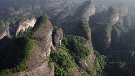 Aerial:-Bajiao-Shan-mountain-valley,-karst-mountains-in-Guangzhou-China