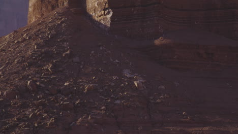 Tilt-up-shot-of-huge-sandstone-rock-pinnacle-in-Marble-Canyon,-Arizona