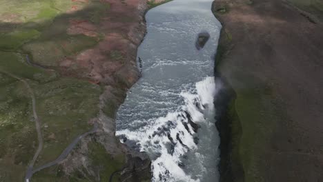 High-above-Gullfoss-waterfall-on-cloudy-day-in-Iceland,-Golden-circle
