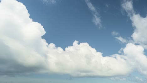 4K-Timelapse-Static-B-Roll-Footage-of-White-Fluffy-Cumulus-Clouds-Forming-in-Blue-Skies