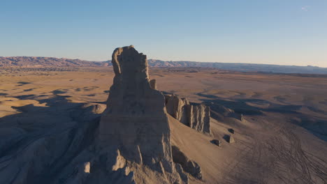 Aerial-view-of-Badlands-with-a-beautiful-clear-blue-sky-in-Utah,-drone