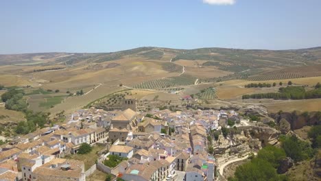 Top-view-of-the-town-of-Alhama-de-Granada-with-many-agriculture-fields-on-the-horizon
