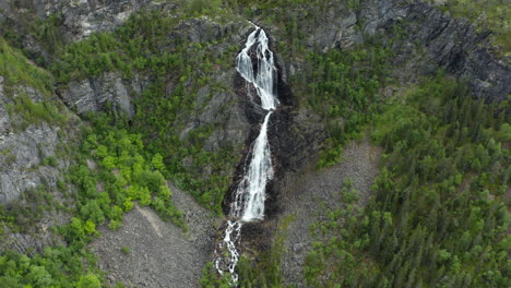 Aerial-view-around-the-Gloppefossen-waterfall,-summer-day,-in-Agder,-South-Norway---circling,-drone-shot