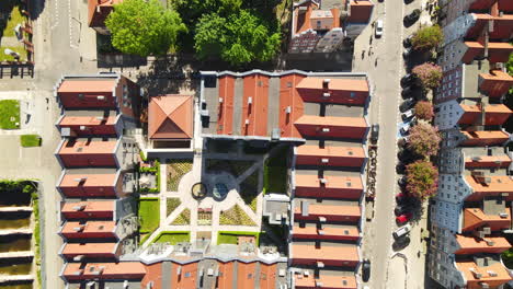 Red-tiled-roofs-of-Old-Town-buildings-block-in-Gdansk---aerial-top-down-view-from-drone