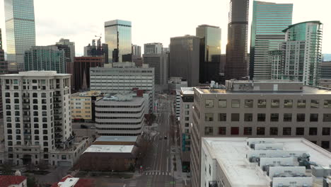 Downtown-Denver,-Colorado-USA,-Aerial-View,-Corporate-and-Residential-Buildings-at-Sunset,-Dolly-Drone-Shot