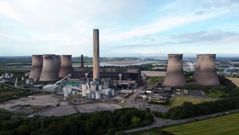 Fiddlers-ferry-power-station-cooling-towers-aerial-view-across-rural-green-field-farmland-crop-risig-push-in