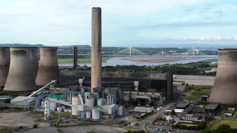 Fiddlers-ferry-power-station-cooling-towers-aerial-view-across-rural-power-plant-orbit-right