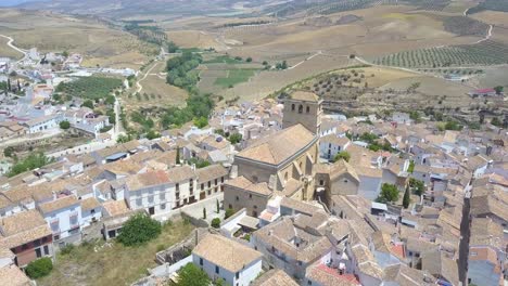 Aerial-tilt-down-shot-of-the-beautiful-church-of-Alhama-de-Granada-in-Andalusia