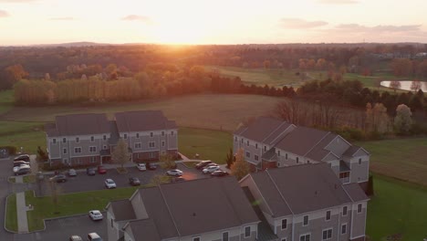 Establishing-shot-of-apartment-building-in-USA-at-sunrise,-sunset