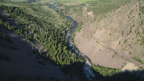 Aerial-Drone-of-River-Running-through-Forest-in-Colorado-Rocky-Mountains