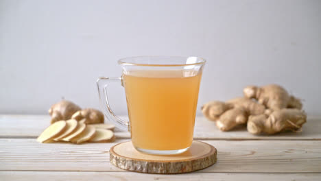 fresh-and-hot-ginger-juice-glass-with-ginger-roots---Healthy-drink-style